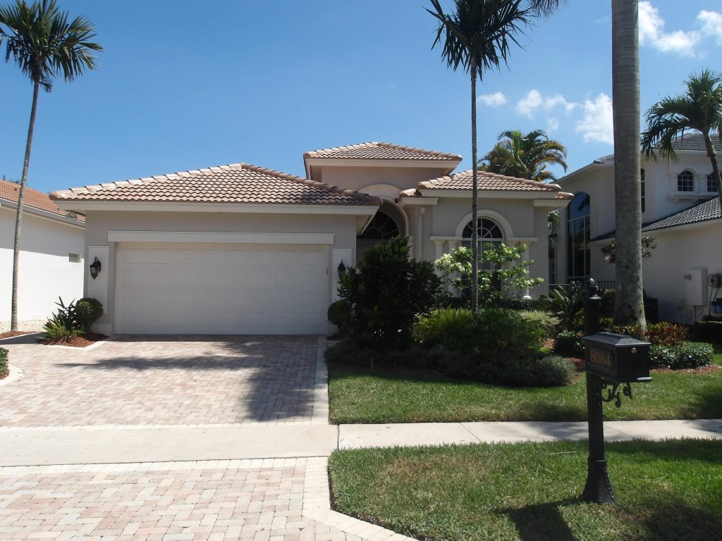 Completed tile re-roof by Caldwell Roofing on a South Florida home