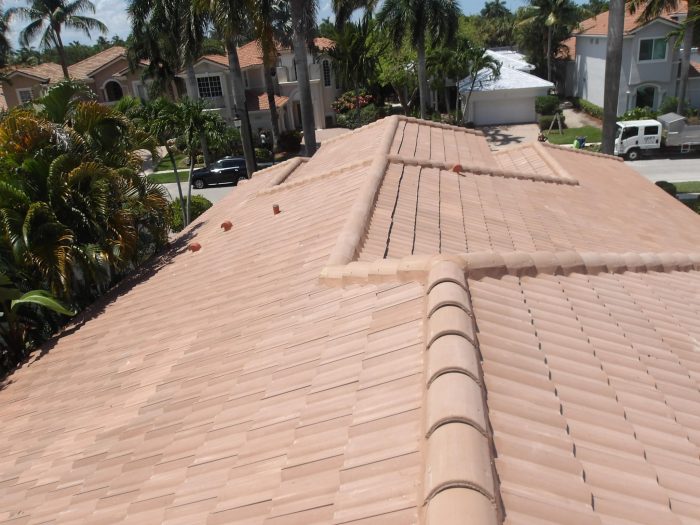 Caldwell crew view across a tile roof under repair in South Florida