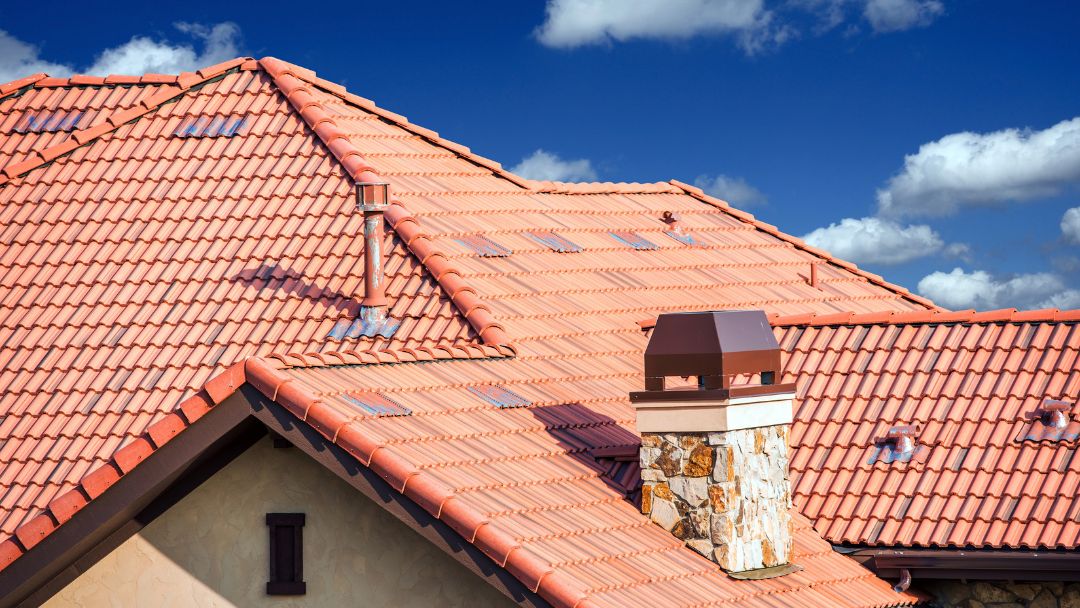 Red clay tile shingle roof with different roof shapes